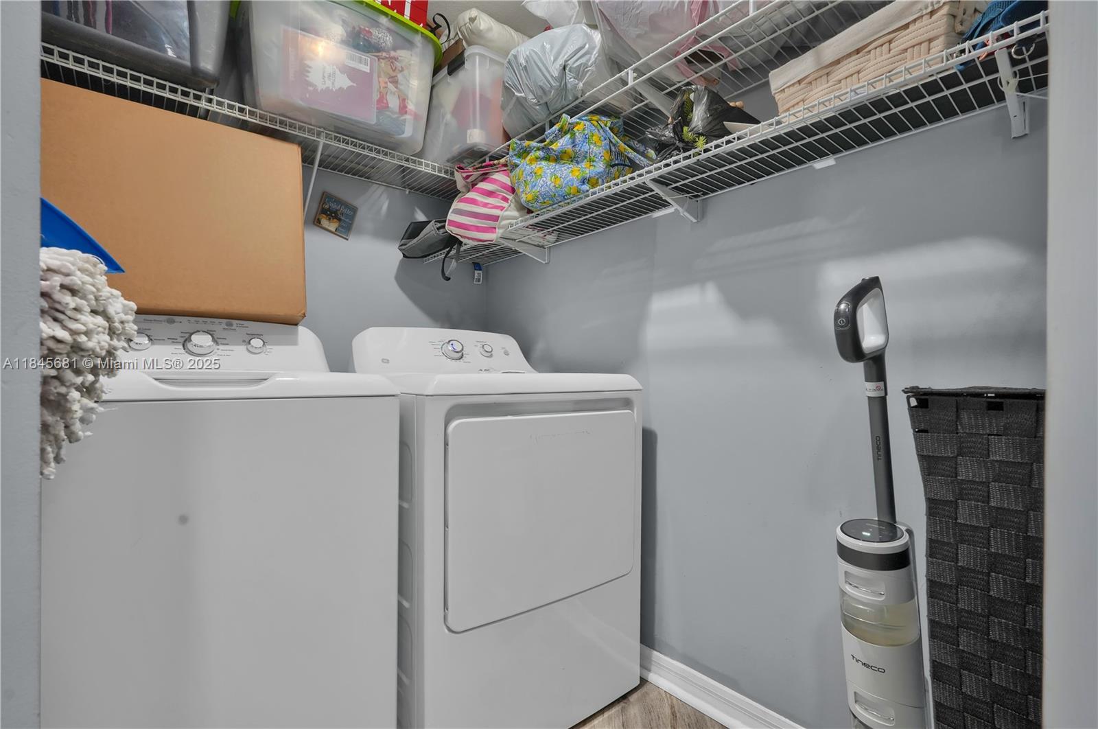 4242 Northwest 2nd Street, Unit 804 Miami, FL 33126 - Photo 18 of 30 a utility room with dryer and washer