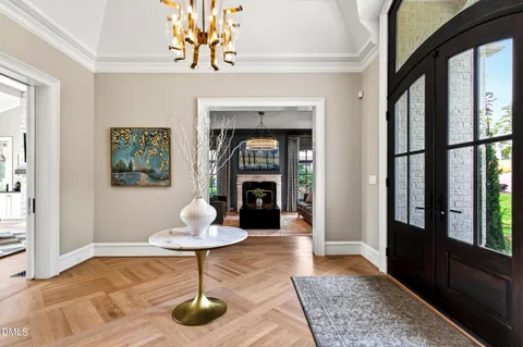 a living room with fireplace furniture and a fireplace