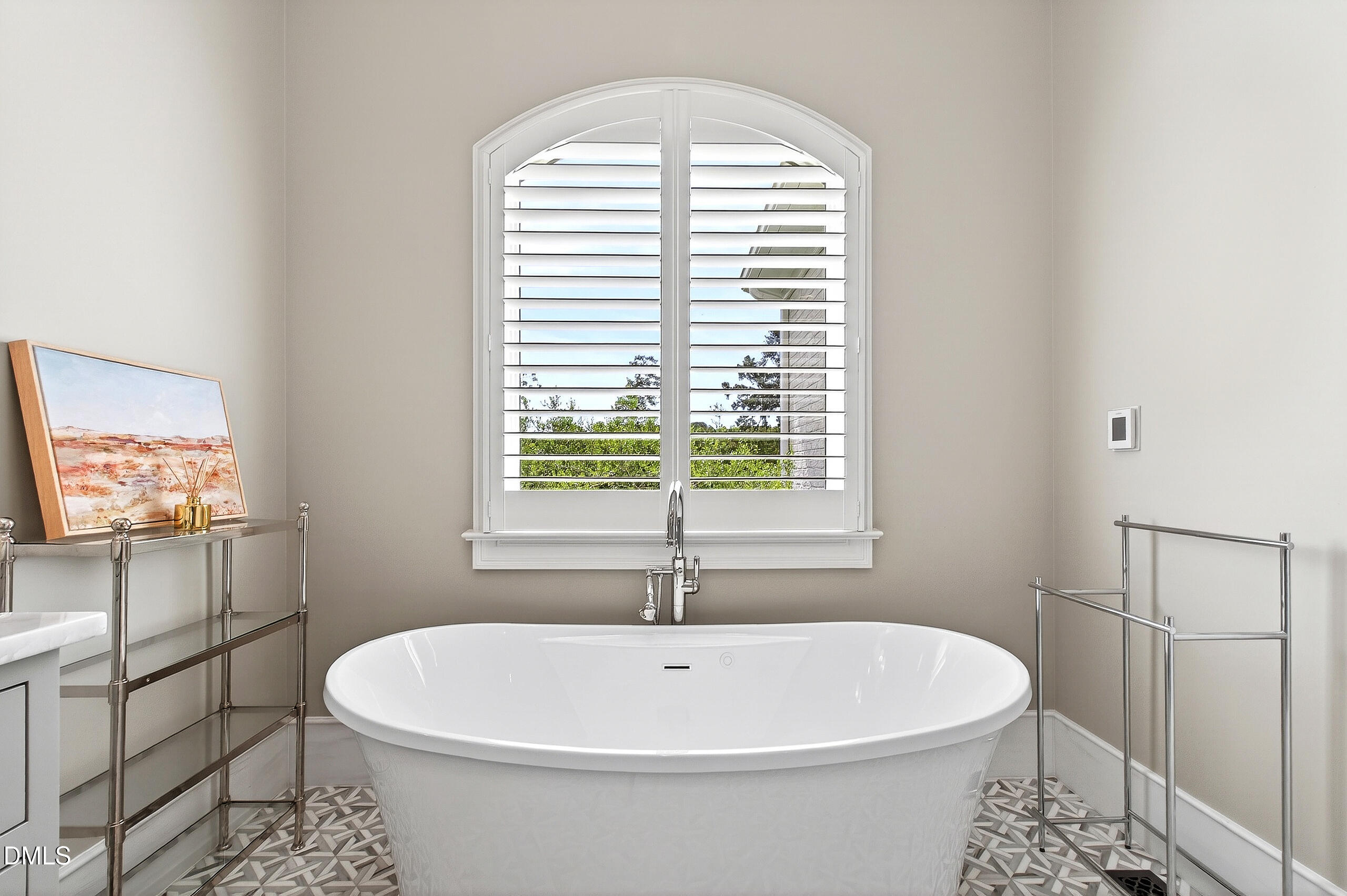 1404 Rock Dam Court Raleigh, NC 27615 - Photo 44 of 97 a white bath tub sitting next to a white sink