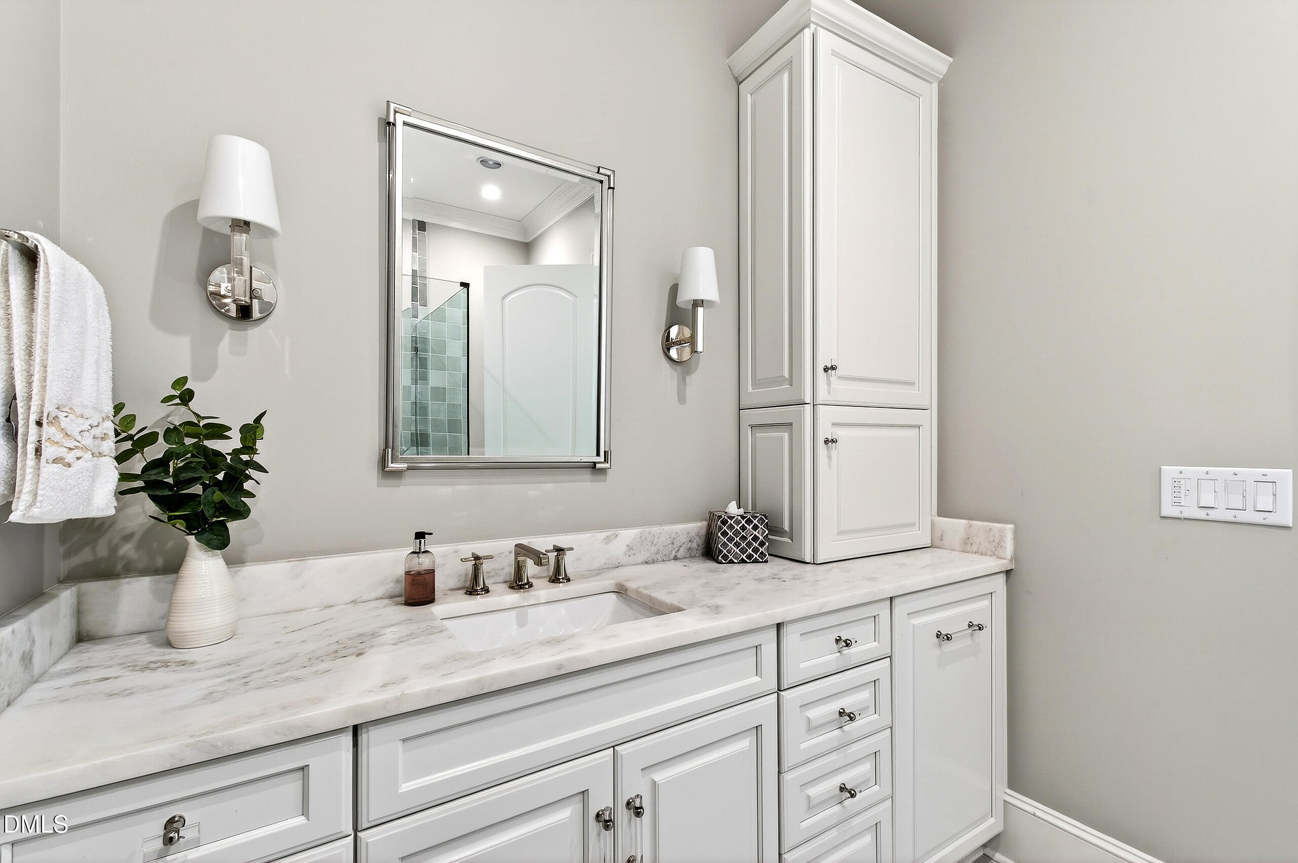 1404 Rock Dam Court Raleigh, NC 27615 - Photo 50 of 97 a bathroom with a granite countertop sink and a mirror