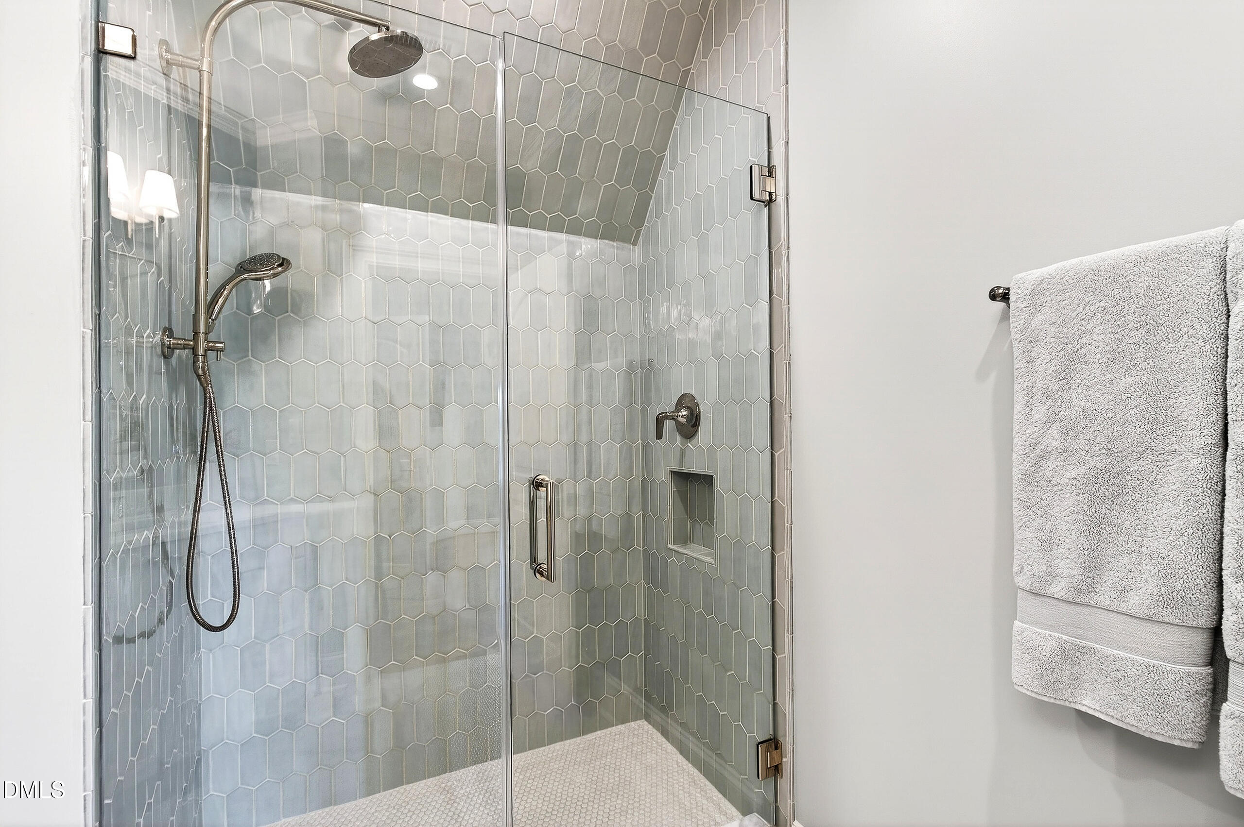 1404 Rock Dam Court Raleigh, NC 27615 - Photo 74 of 97 a bathroom with a glass shower door