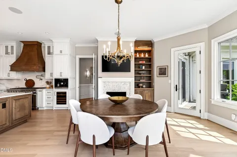 a living room with furniture and a ceiling fan