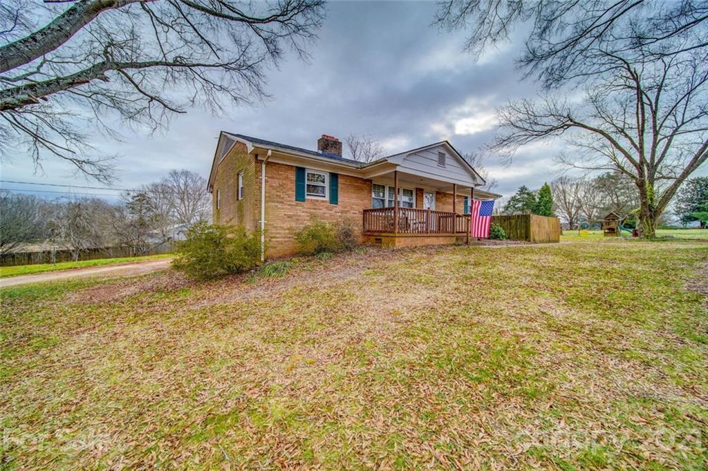 1260 Goodnight Road Salisbury, NC 28147 - Photo 2 of 13 a view of a house with a yard and a large tree