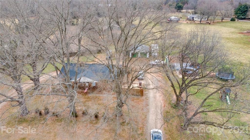 1260 Goodnight Road Salisbury, NC 28147 - Photo 13 of 13 a backyard of a house with lots of green space