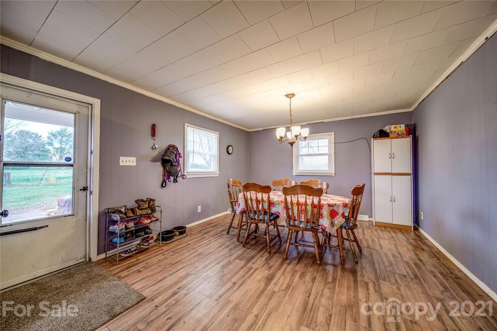 1260 Goodnight Road Salisbury, NC 28147 - Photo 4 of 13 a view of a dining room with furniture and wooden floor