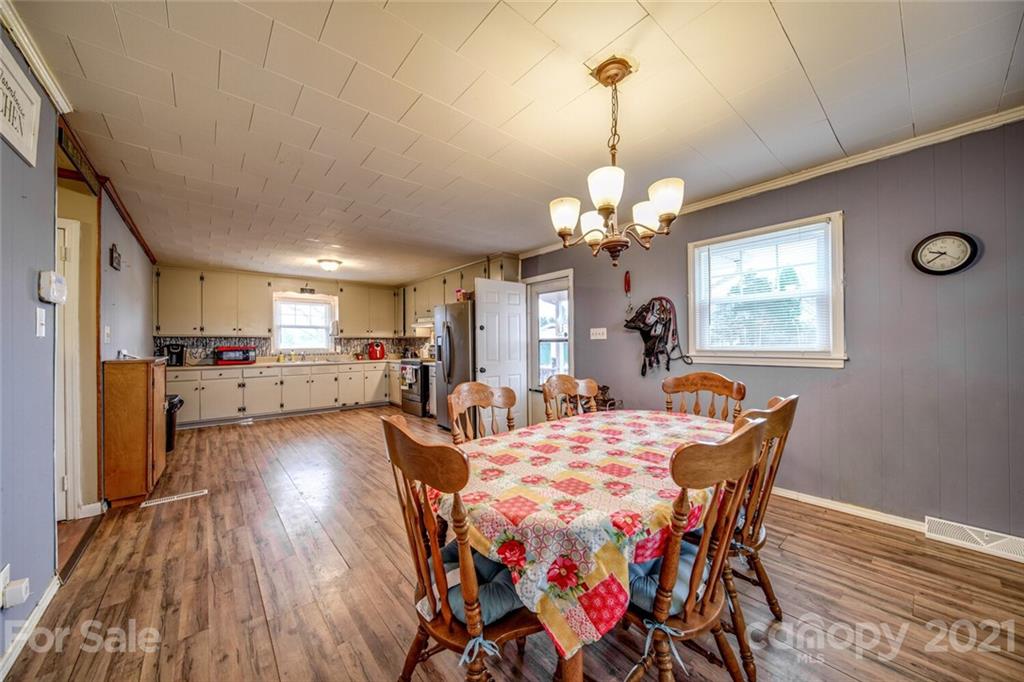 1260 Goodnight Road Salisbury, NC 28147 - Photo 6 of 13 a view of a dining room with furniture and wooden floor