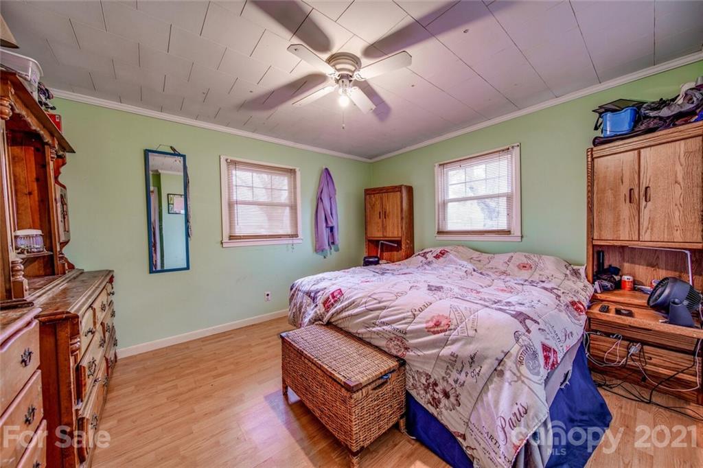 1260 Goodnight Road Salisbury, NC 28147 - Photo 9 of 13 a spacious bedroom with a bed and a dresser in it