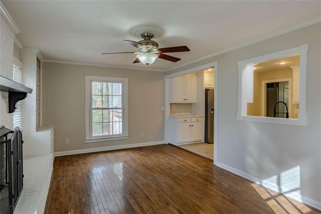 30 Polaris Terrace Northwest Rome, GA 30165 - Photo 19 of 44 a view of an empty room with a window and wooden floor