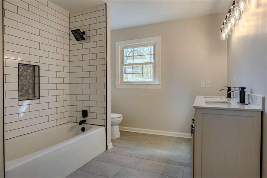 30 Polaris Terrace Northwest Rome, GA 30165 - Photo 27 of 44 a bathroom with a sink a toilet and bathtub