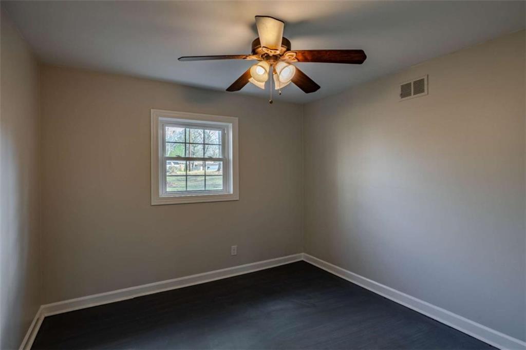 30 Polaris Terrace Northwest Rome, GA 30165 - Photo 30 of 44 an empty room with a window