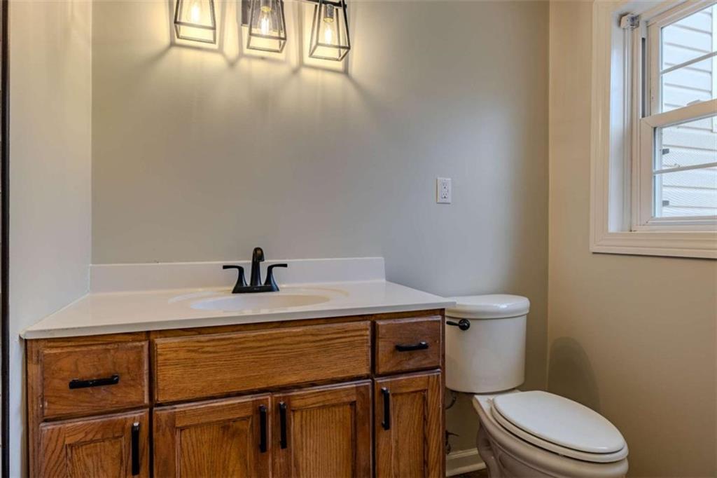 30 Polaris Terrace Northwest Rome, GA 30165 - Photo 34 of 44 a bathroom with a sink a toilet and window