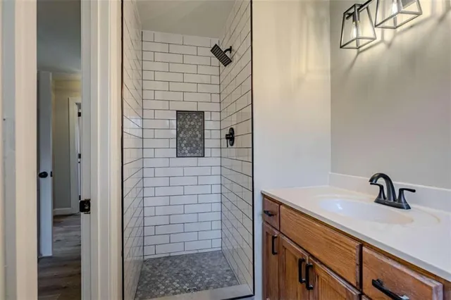 a bathroom with a sink and mirror
