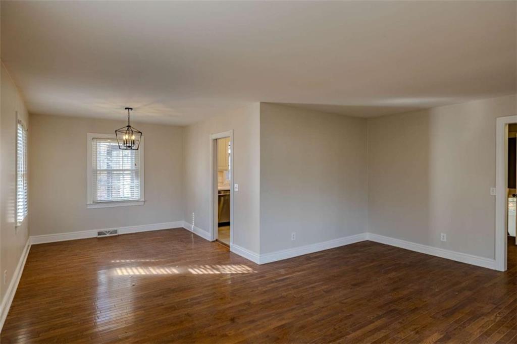 30 Polaris Terrace Northwest Rome, GA 30165 - Photo 9 of 44 an empty room with wooden floor and windows