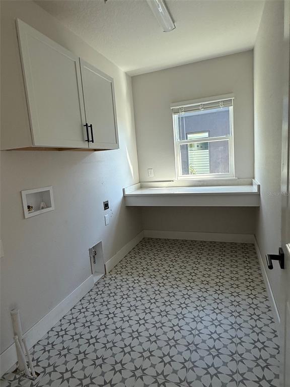 4717 West Laurel Road Tampa, FL 33629 - Photo 12 of 18 a bathroom with a sink a vanity and mirror