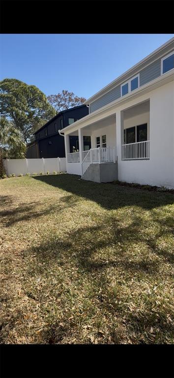 4717 West Laurel Road Tampa, FL 33629 - Photo 13 of 18 a front view of a house with a yard