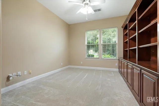 a kitchen with stainless steel appliances granite countertop a sink stove and microwave