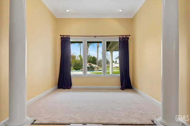 a spacious bathroom with a granite countertop tub sink and mirror