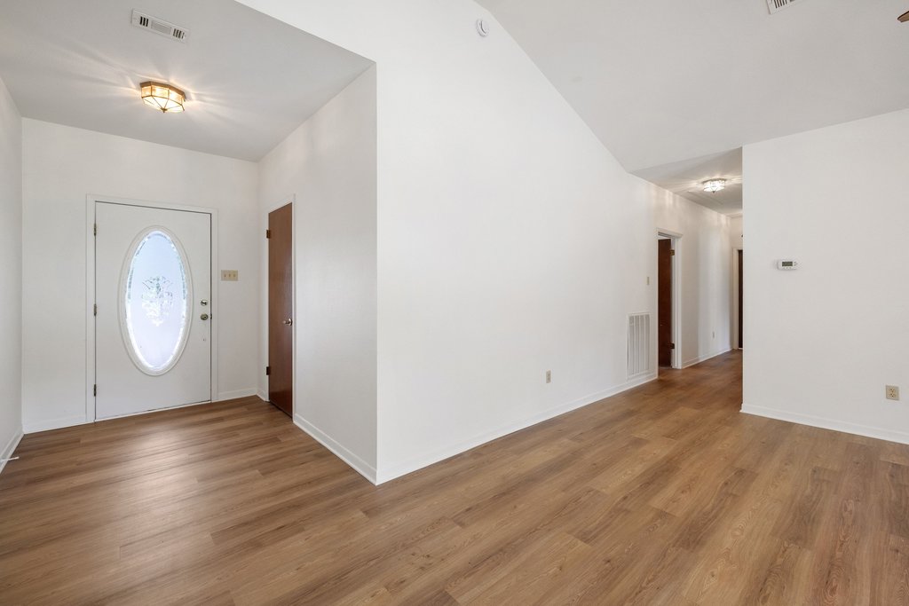 244 Woodway Elgin, TX 78621 - Photo 20 of 40 a view of a room with wooden floor