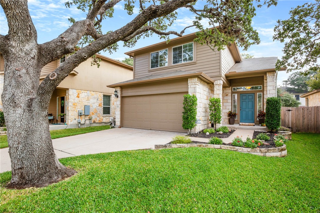 11513 Eric Heiden Court Austin, TX 78748 - Photo 1 of 1 a front view of a house with a garden and yard