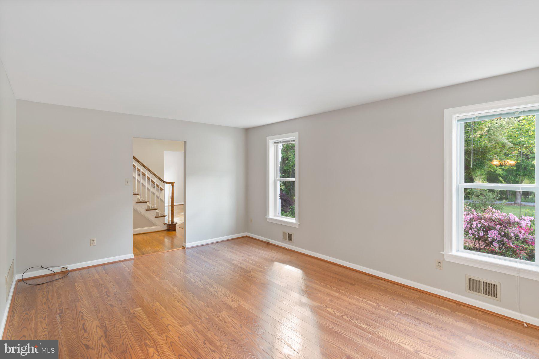 21717 Gunpowder Road Manchester, MD 21102 - Photo 22 of 87 an empty room with wooden floor and windows