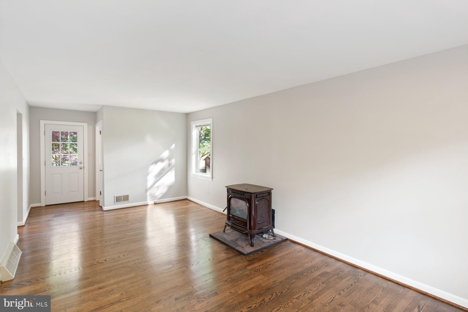 21717 Gunpowder Road Manchester, MD 21102 - Photo 24 of 87 a view of an empty room with wooden floor and a window