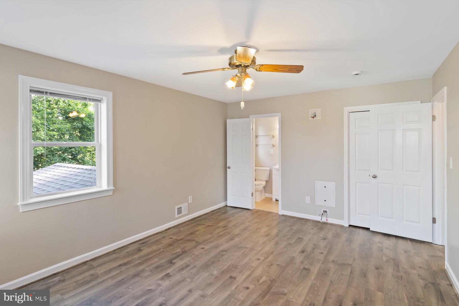 21717 Gunpowder Road Manchester, MD 21102 - Photo 33 of 87 wooden floor in an empty room with a window