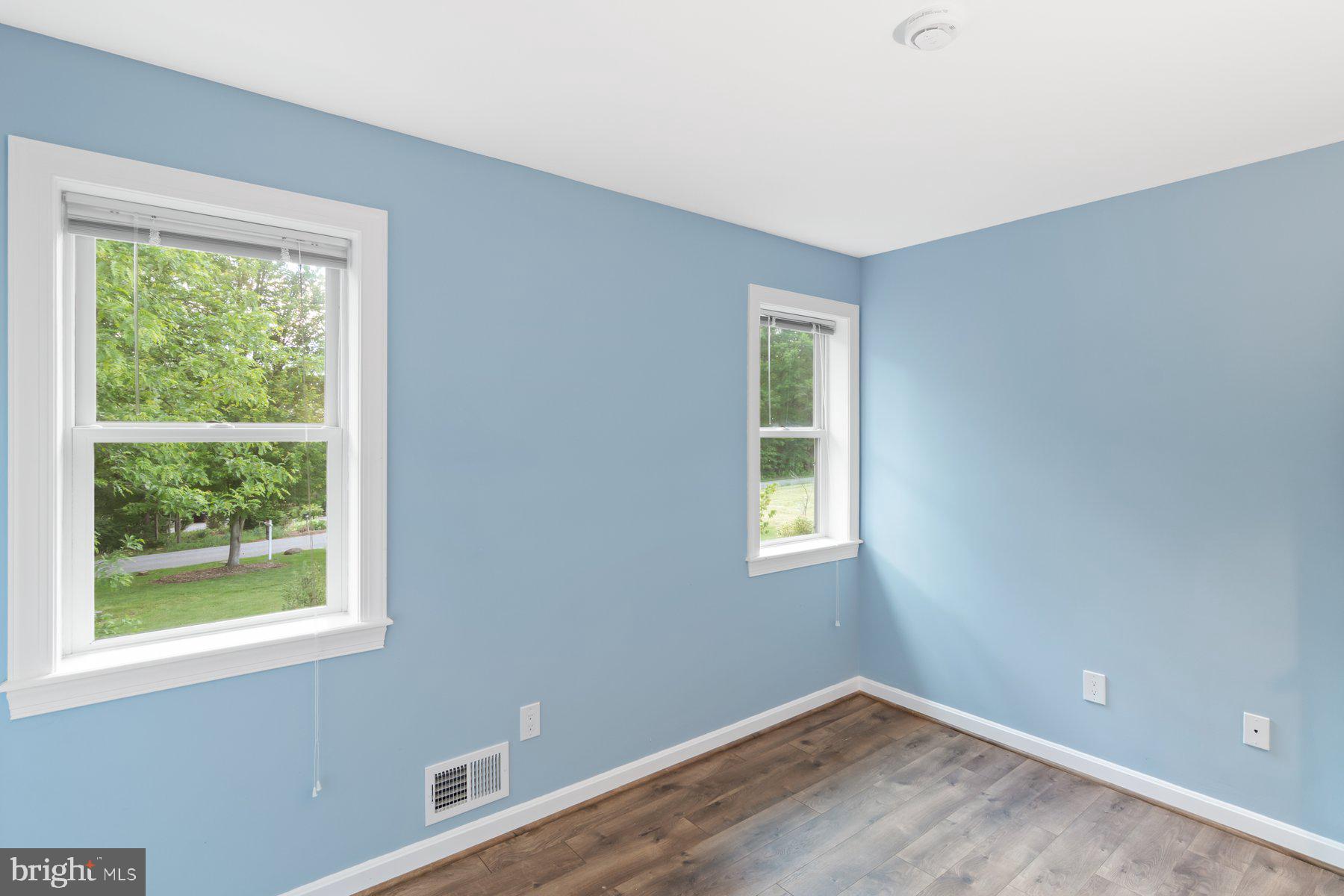 21717 Gunpowder Road Manchester, MD 21102 - Photo 35 of 87 a view of a room with wooden floor and windows