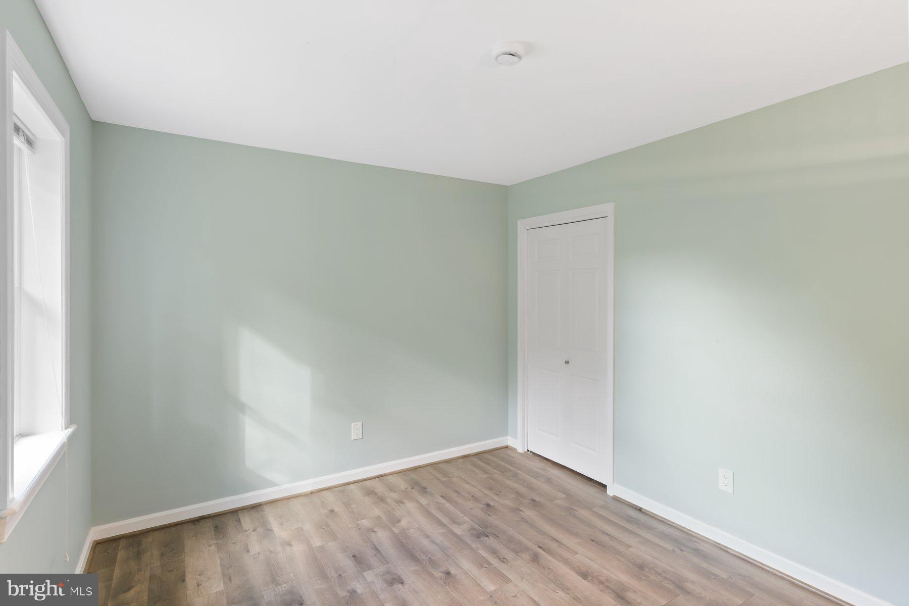 21717 Gunpowder Road Manchester, MD 21102 - Photo 37 of 87 a view of an empty room with wooden floor