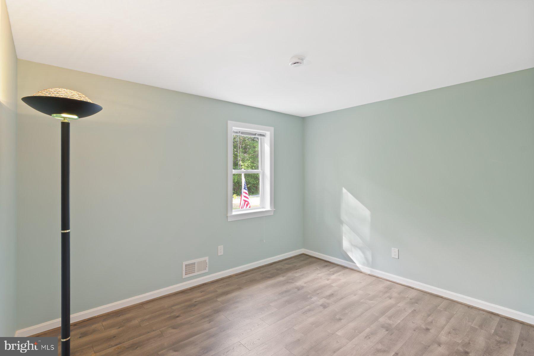 21717 Gunpowder Road Manchester, MD 21102 - Photo 38 of 87 a view of empty room with wooden floor and fan