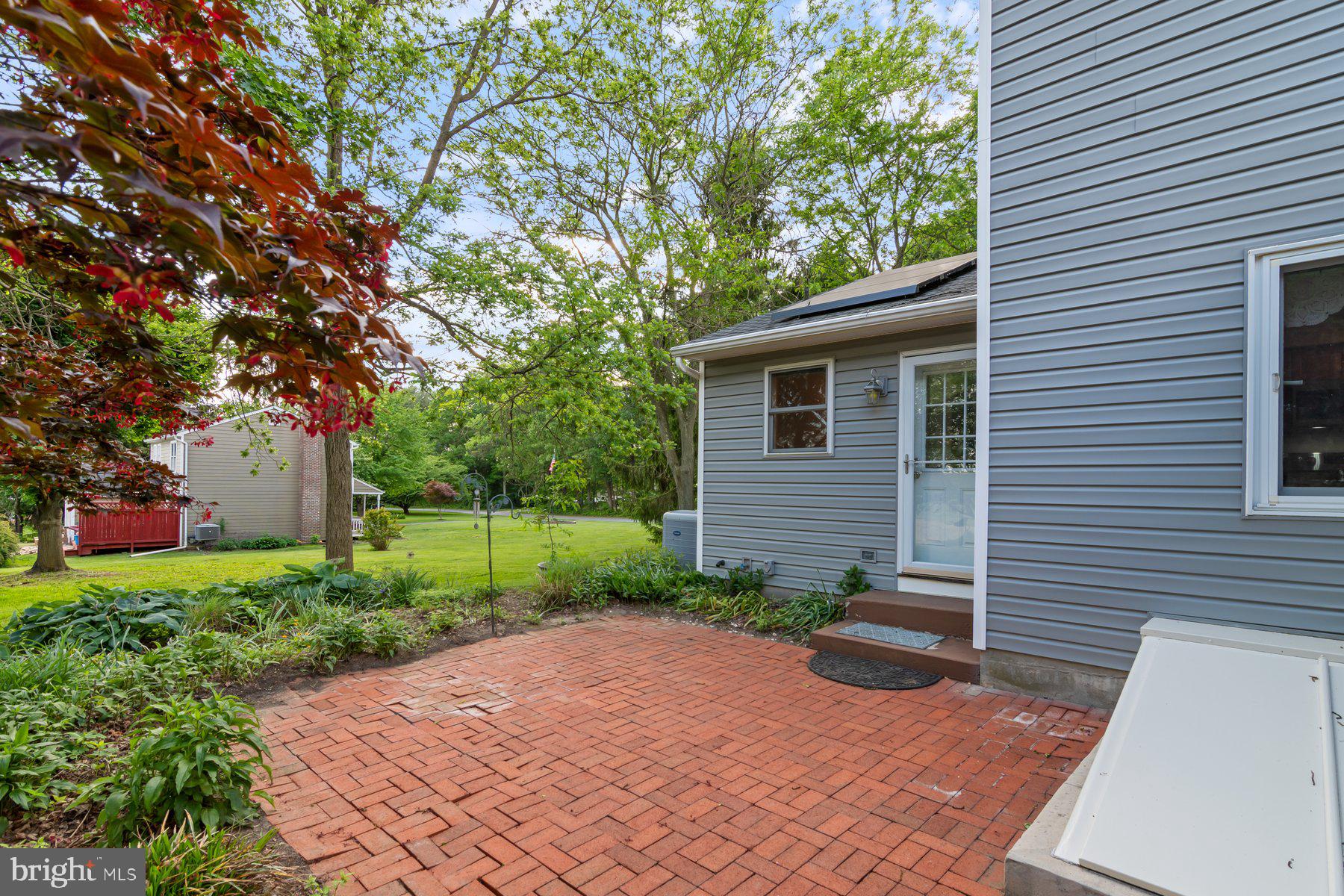 21717 Gunpowder Road Manchester, MD 21102 - Photo 58 of 87 a view of a backyard with plants and large tree