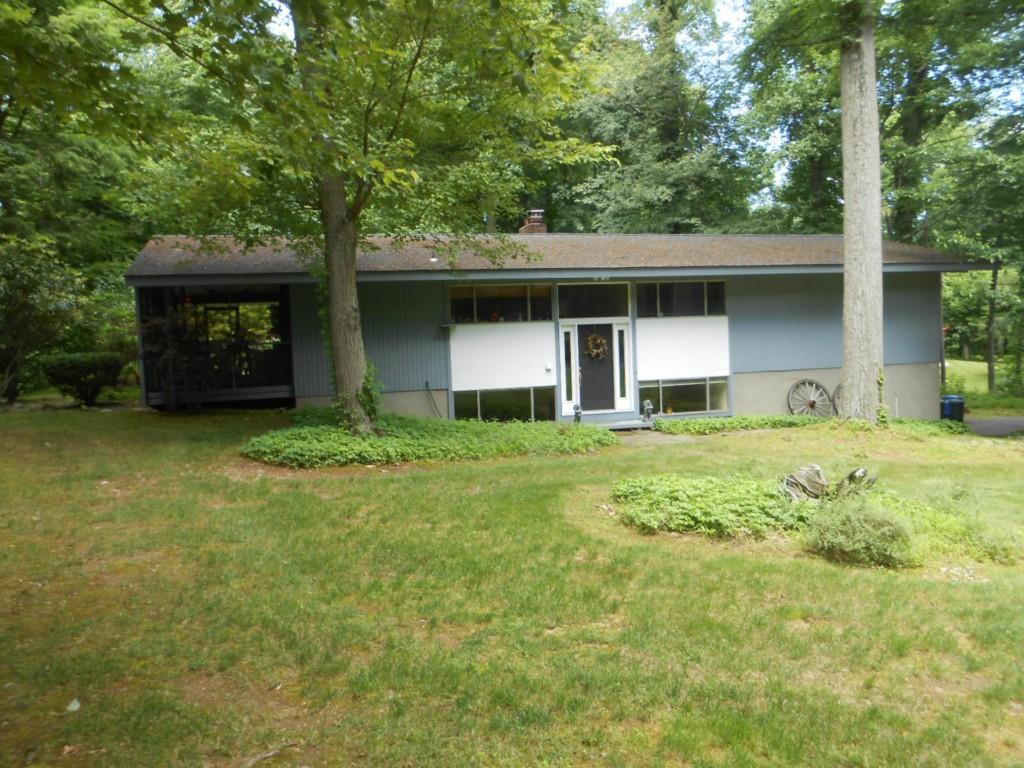 a house view with a garden space