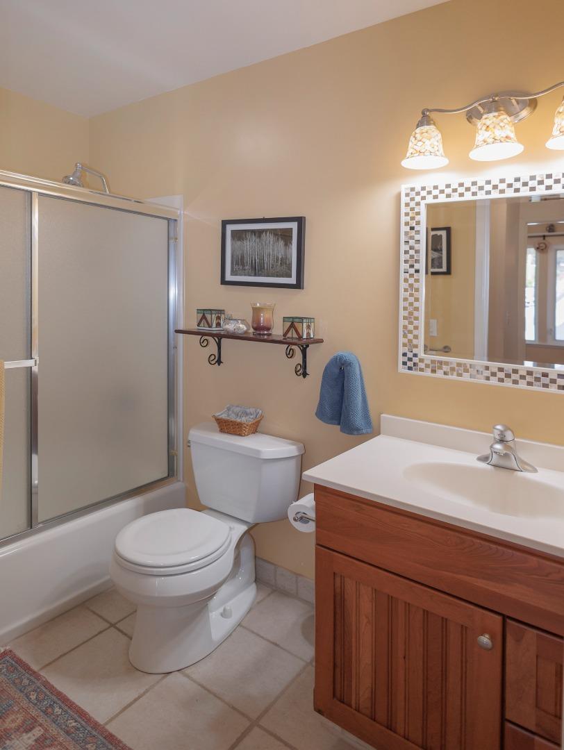 803 Big Bend Drive Pacifica, CA 94044 - Photo 15 of 47 a bathroom with a sink toilet vanity and shower