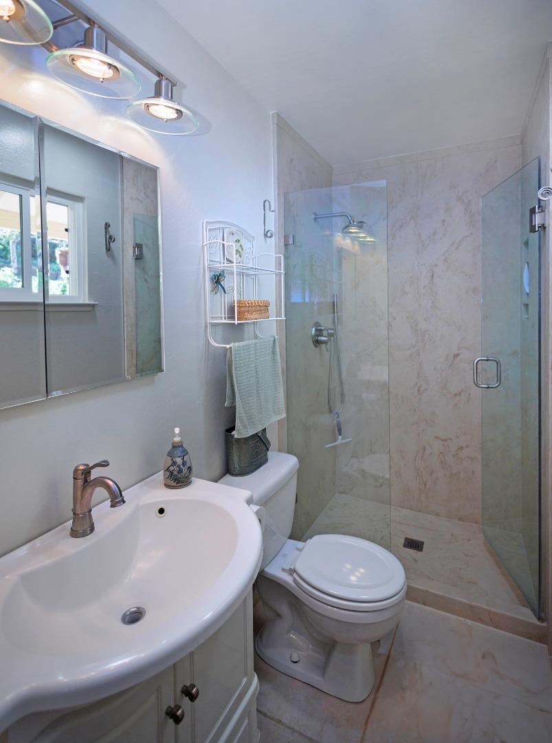 803 Big Bend Drive Pacifica, CA 94044 - Photo 17 of 47 a bathroom with a sink toilet and shower