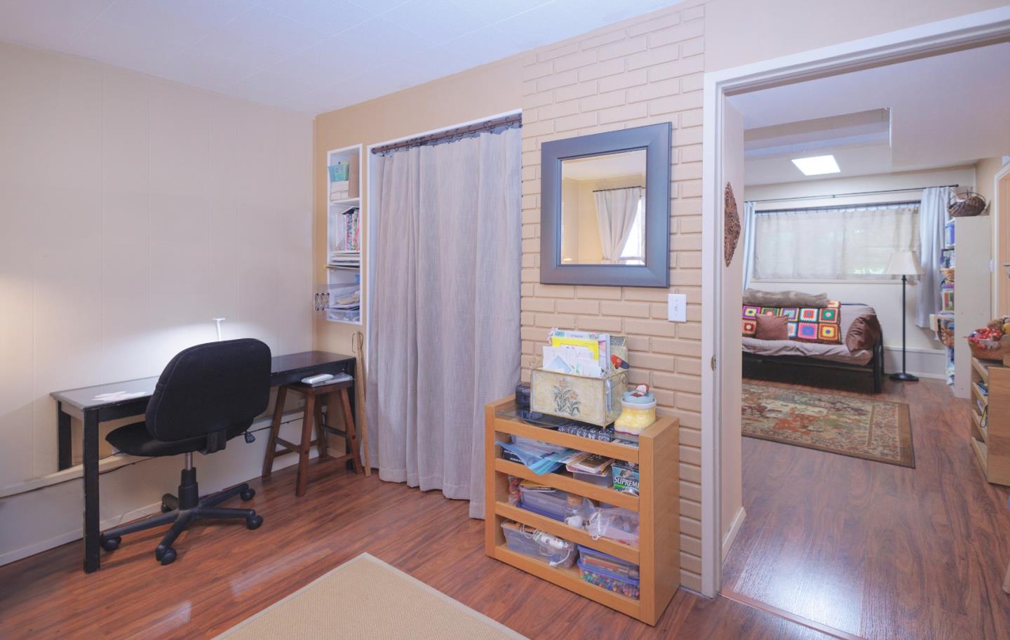 803 Big Bend Drive Pacifica, CA 94044 - Photo 25 of 47 a view of a workspace with furniture and a bedroom