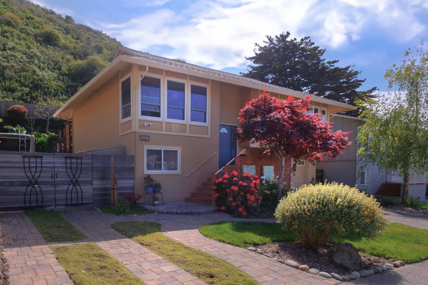803 Big Bend Drive Pacifica, CA 94044 - Photo 40 of 47 a front view of a house with garden