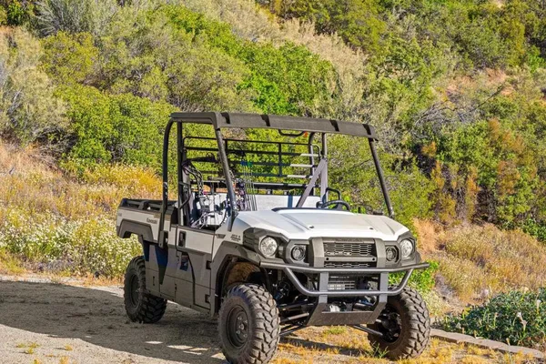a view of a patio with a table and chairs and a fire pit