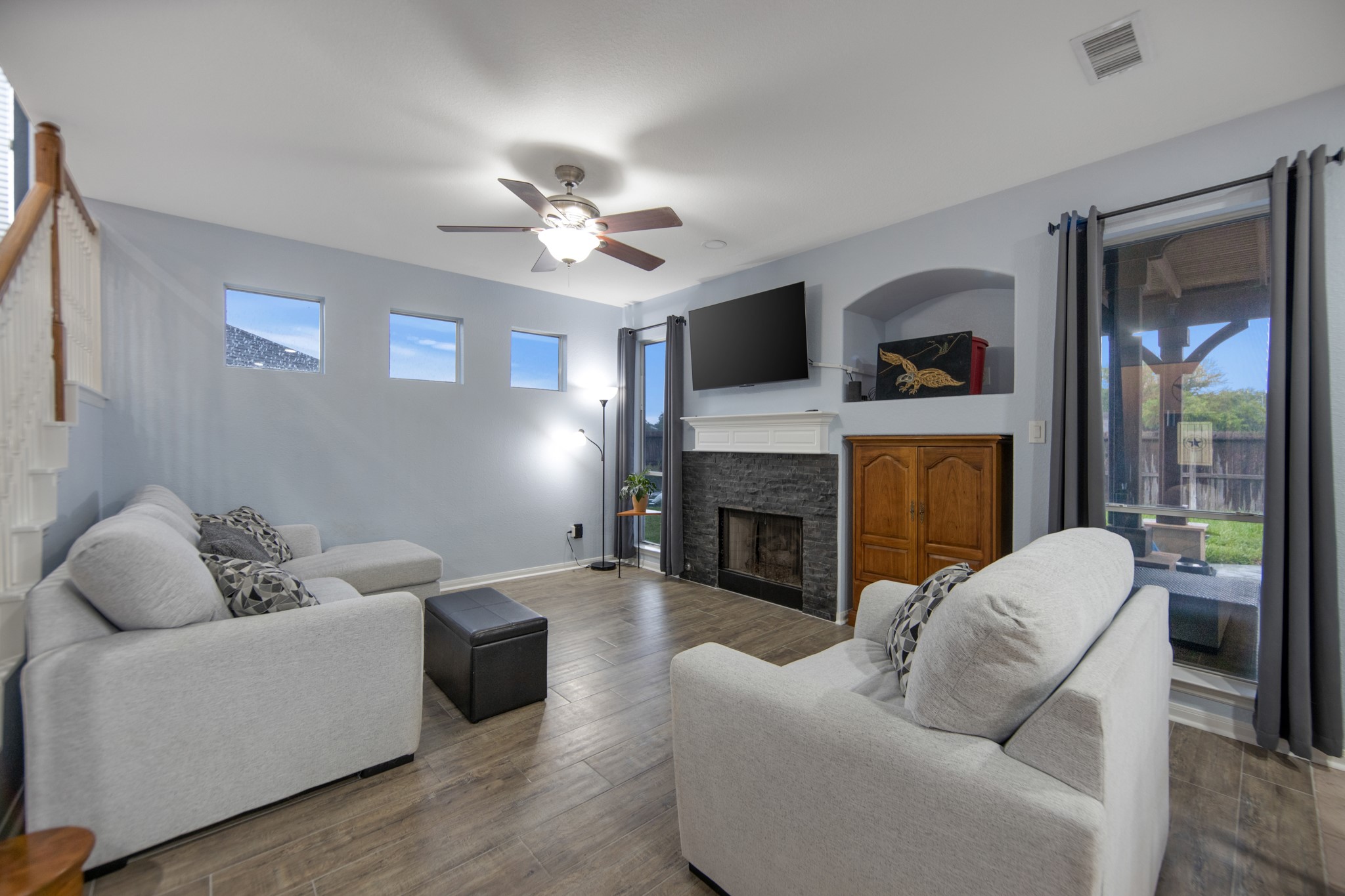19414 Camellia Bend Circle Spring, TX 77379 - Photo 12 of 49 The family room is warm and inviting with the stone, gas-log fireplace that adds that little something extra on those cold winter nights