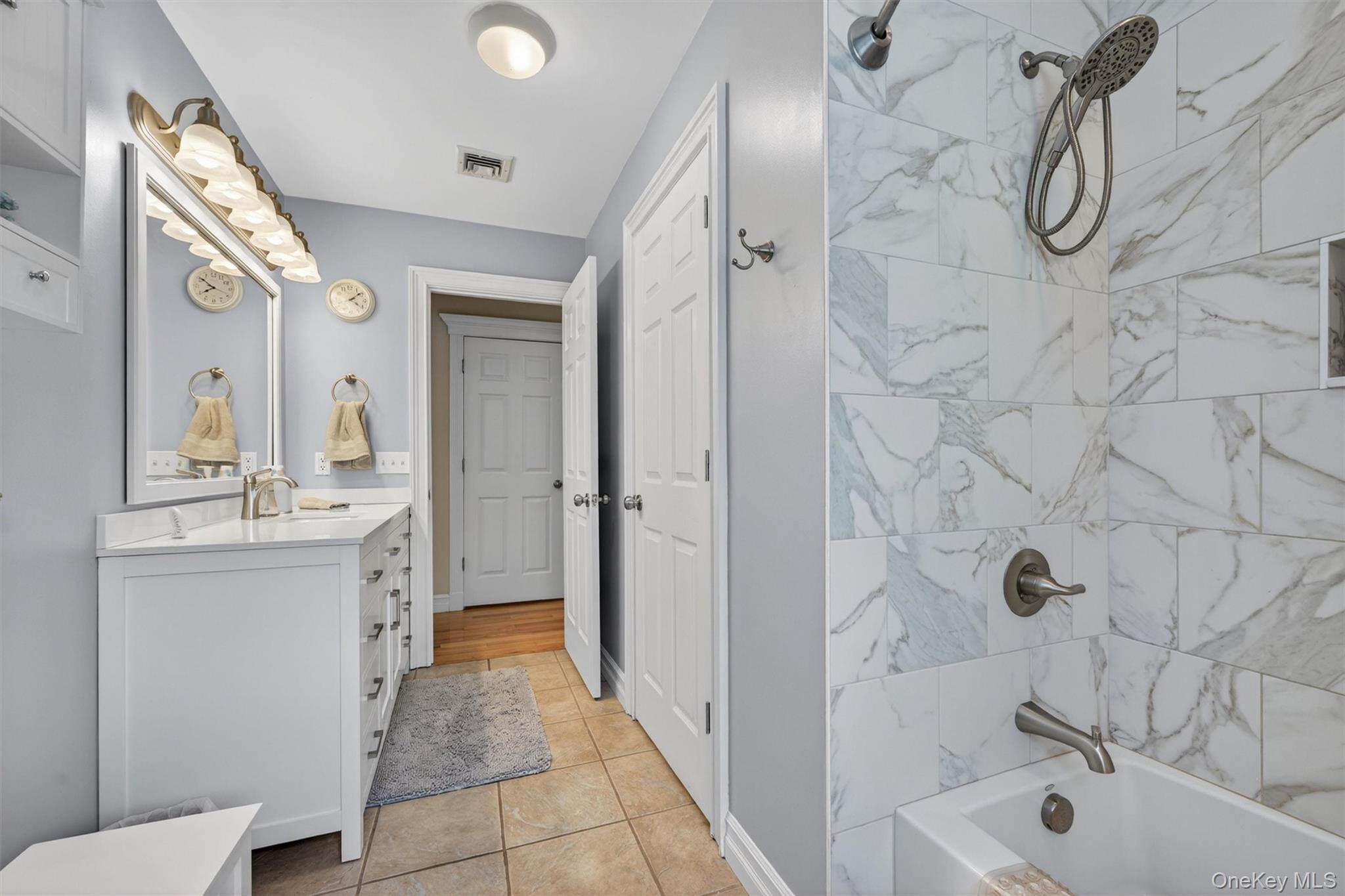 19 Pirog Road Pine Bush, NY 12566 - Photo 34 of 50 a bathroom with a granite countertop sink a toilet and shower