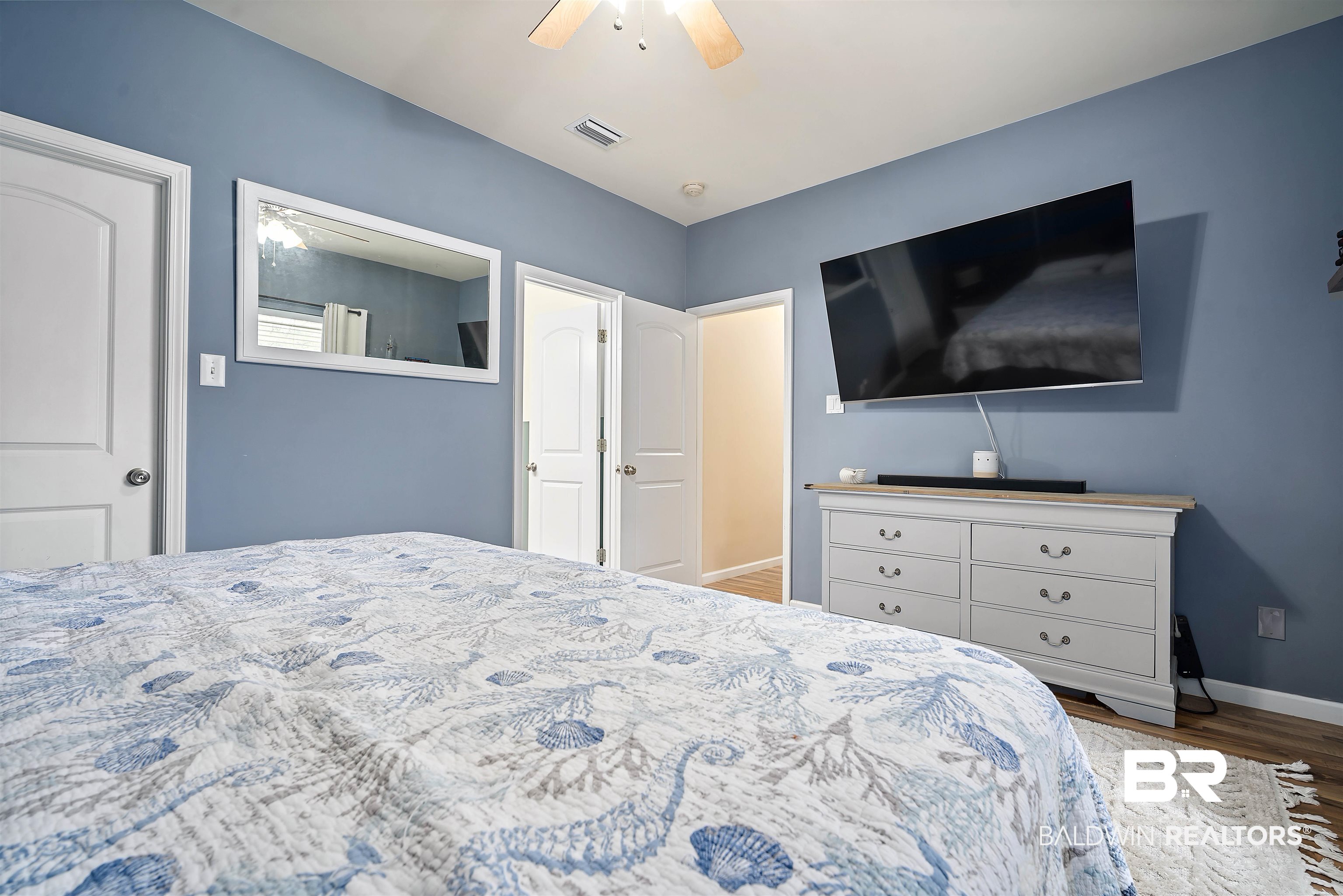 209 Maplewood Loop Daphne, AL 36526 - Photo 13 of 23 Bedroom with ceiling fan and wood finished floors