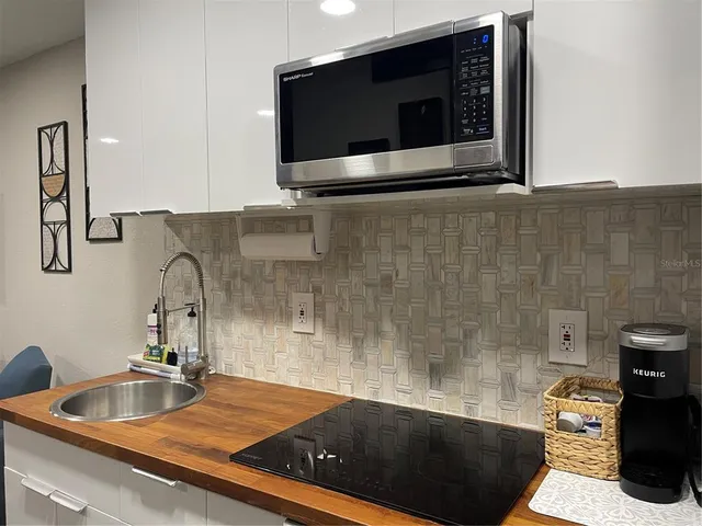 a view of a living room and dining room