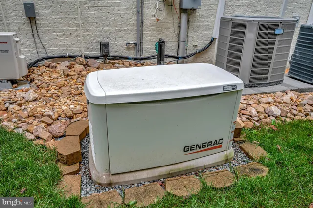 a view of a hallway with wooden floor and windows