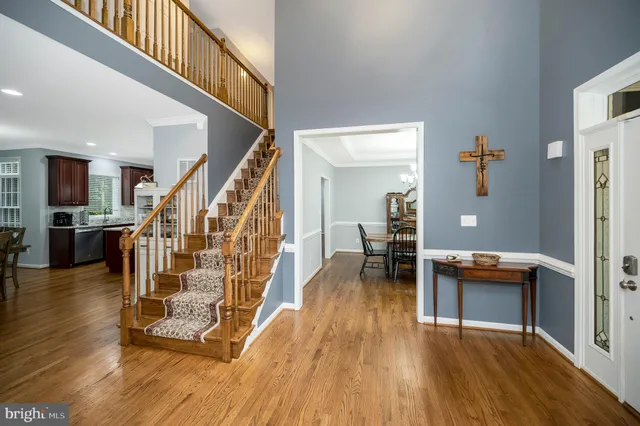 a room with furniture and a wooden floor