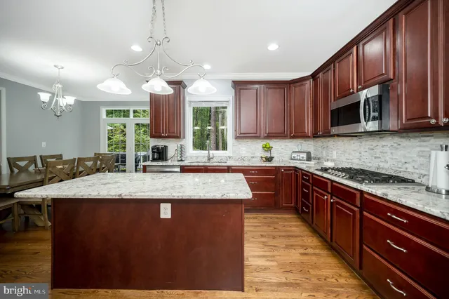 a view of a lake with houses in the background