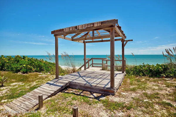 a view of a outdoor space with a table and chairs