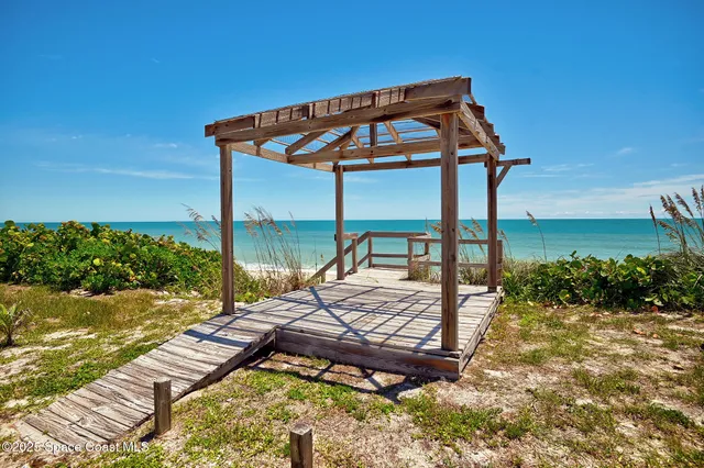 a view of a outdoor space with a table and chairs