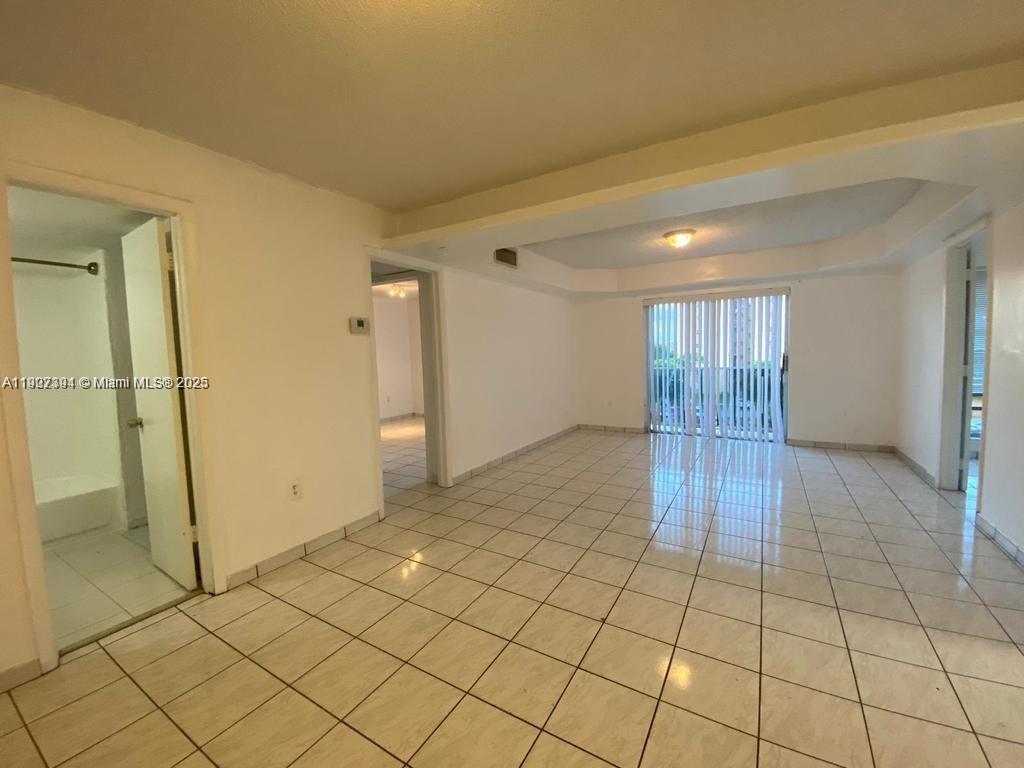 4803 Northwest 7th Street, Unit 40314 Miami, FL 33126 - Photo 11 of 16 a view of empty room
