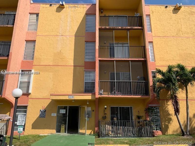 4803 Northwest 7th Street, Unit 40314 Miami, FL 33126 - Photo 16 of 16 a view of a building with a street