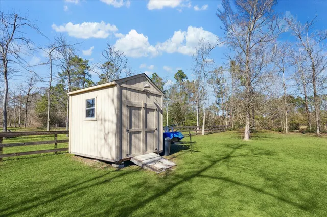 a view of a park with large trees