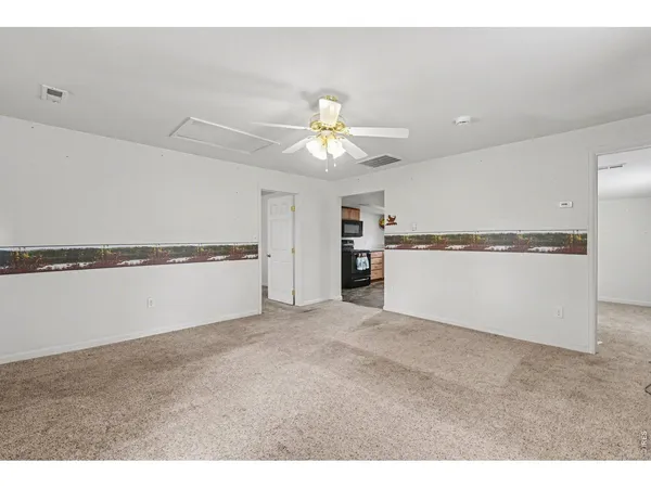 a view of a kitchen with a sink and a kitchen