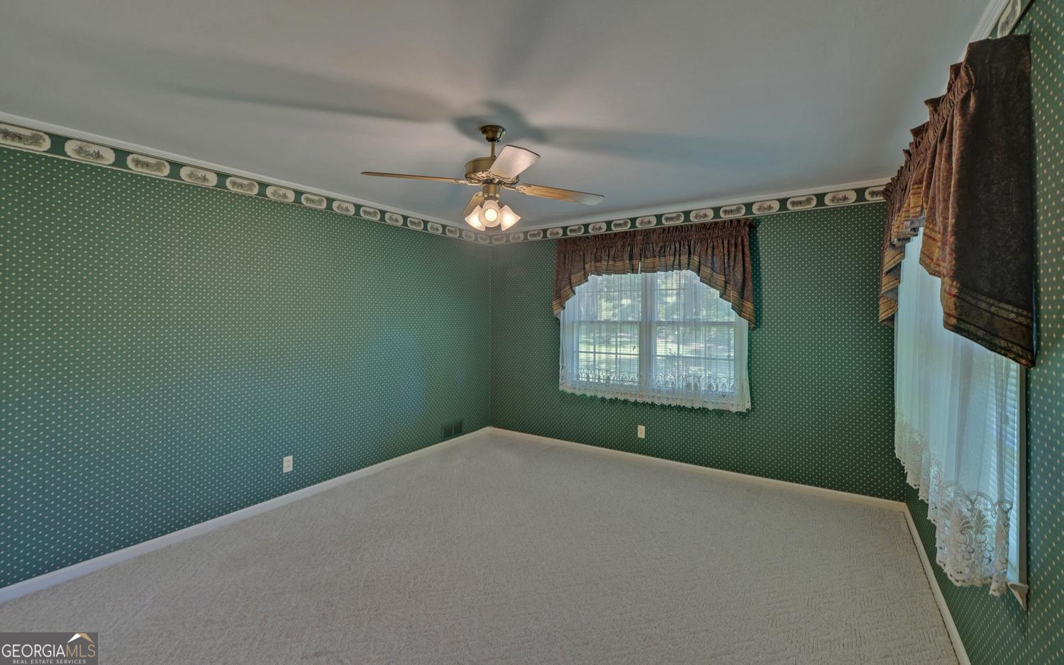 400 Harris Street Toccoa, GA 30577 - Photo 19 of 49 a view of a window in an empty room